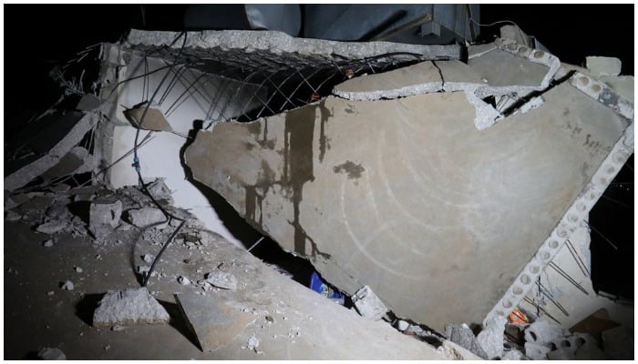 A damaged building is seen in the aftermath of a counter-terrorism mission conducted by the U.S. Special Operations Forces in Atmeh, Syria, February 3, 2022 in this picture obtained from social media. Photo: Reuters