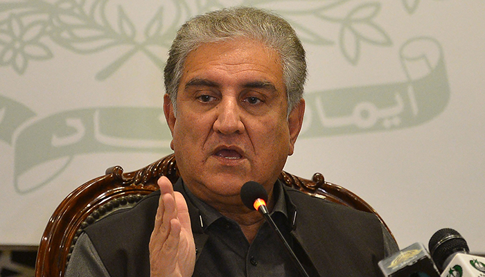 Pakistan´s foreign minister Shah Mahmood Qureshi gestures while addressing the members of the media in Islamabad on February 25, 2022. — AFP