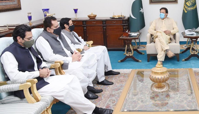 PM Imran Khan holding a meeting with Pervez Elahi and others — PID/File