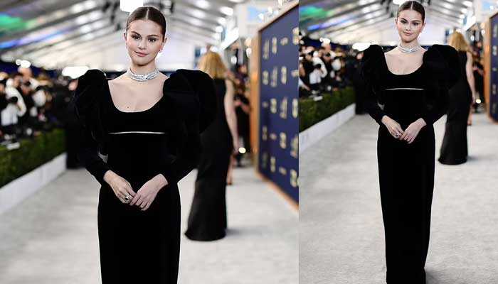 Selena Gomez walks onstage barefoot after falling on the SAG Awards red carpet