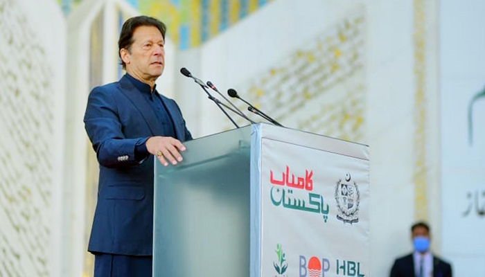 Prime Minister Imran Khan addressing the cheque distribution ceremony of Kamyab Pakistan interest-free loans at Faisal Mosque Islamabad on March 2, 2022. — PID