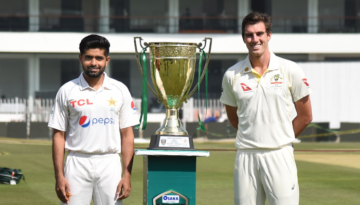 Pakistan skipper Babar Azam (L) and his Australian counterpart Pat Cummins. — PCB