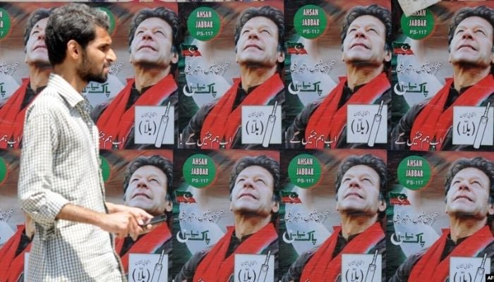 Electoral posters of Prime Minister and former cricketer Imran Khan during 2018 elections in Karachi. Photo: RadioFreeEurope/File