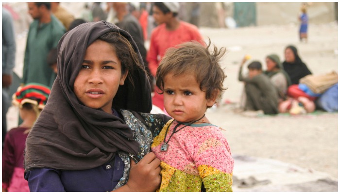 Siblings who arrived from Afghanistan with their families are seen at their makeshift tents as they take refuge near a railway station in Chaman, Pakistan September 1, 2021. — Reuters/Saeed Ali Achakzai