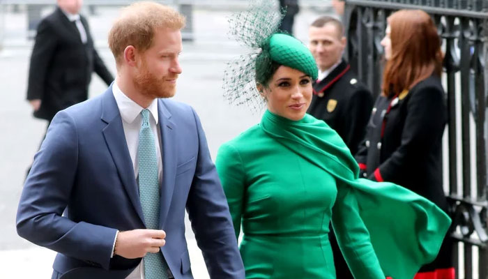 Meghan Markle wore a vibrant green cape dress at final royal outing for a reason