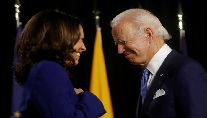 Democratic presidential candidate and former Vice President Joe Biden and vice presidential candidate Senator Kamala Harris are seen at the stage during a campaign event, their first joint appearance since Biden named Harris as his running mate, at Alexis Dupont High School in Wilmington, Delaware, August 12, 2020. REUTERS/Carlos Barria