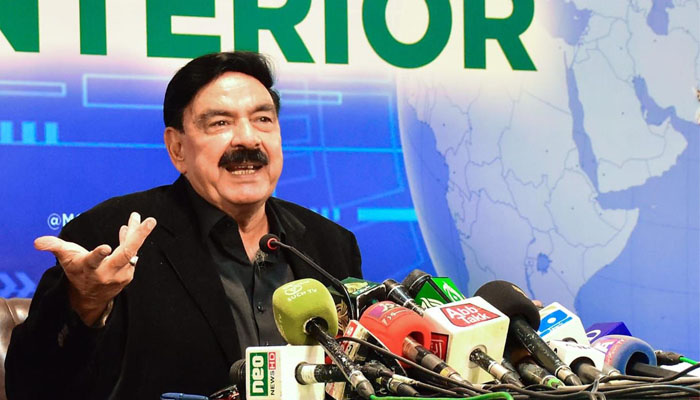 Interior Minister Sheikh Rasheed addresses a press conference in this undated photo. — PID