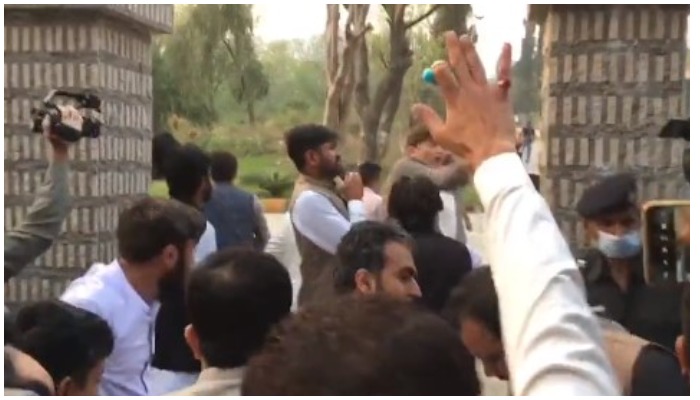PTI workers barging into the Sindh House after tearing down its gate, here in Islamabad on March 18, 2022. — Screengrab via Twitter/ Murtaza Ali Shah