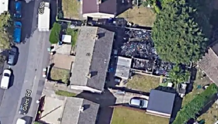 A mountain of bikes can be seen in the garden of a house on Giles Road.  — SWNS/Google Earth