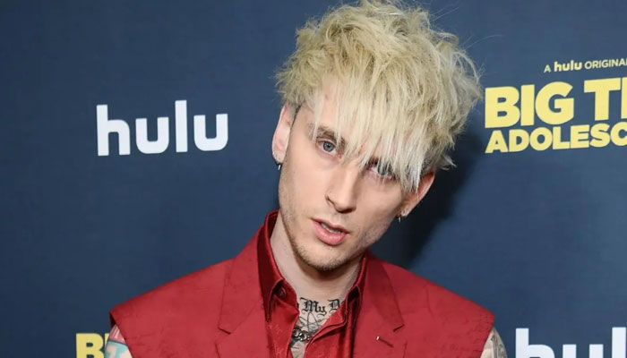 Machine Gun Kelly revealed that he bonded with his father over a song