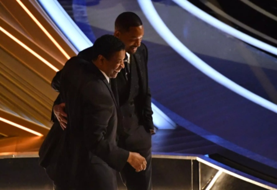 Will Smith speaks with Bradley Cooper, Denzel Washington after scuffle with Chris Rock