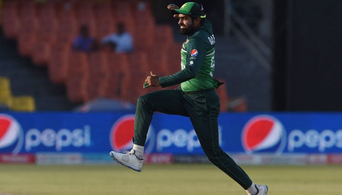 Pakistans captain Babar Azam celebrates the dissmissal of Australias Alex Carey during the third and final ODI between Pakistan and Australia at the Gaddafi Cricket Stadium in Lahore. — AFP