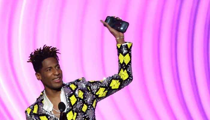 Genre-spanning artist Batiste wins four early Grammys