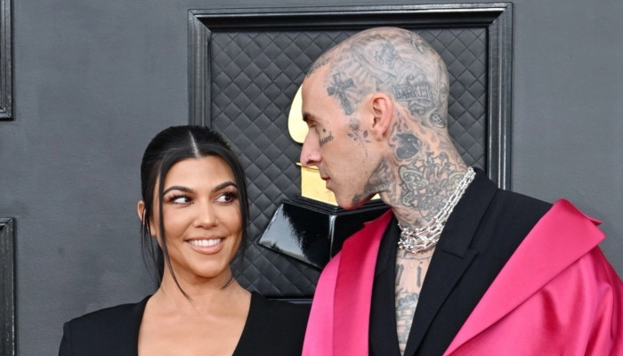 Kourtney Kardashian cheers for fiancé Travis Barker during 2022 Grammys