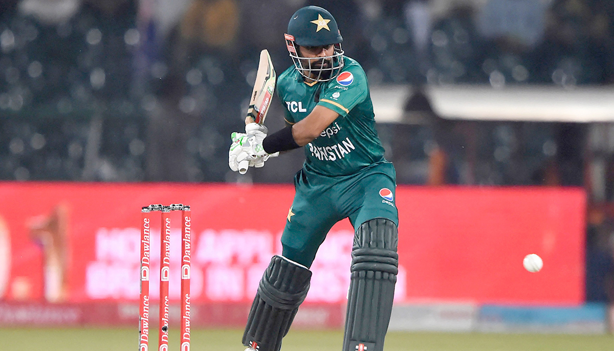 Pakistans captain Babar Azam plays a shot during the Twenty20 international cricket match between Pakistan and Australia at the Gaddafi Cricket Stadium in Lahore on April 5, 2022. — AFP