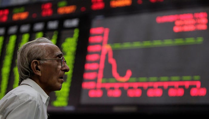 An investor is looking at the falling curve on a screen at the Pakistan Stock Exchange. — Reuters/File