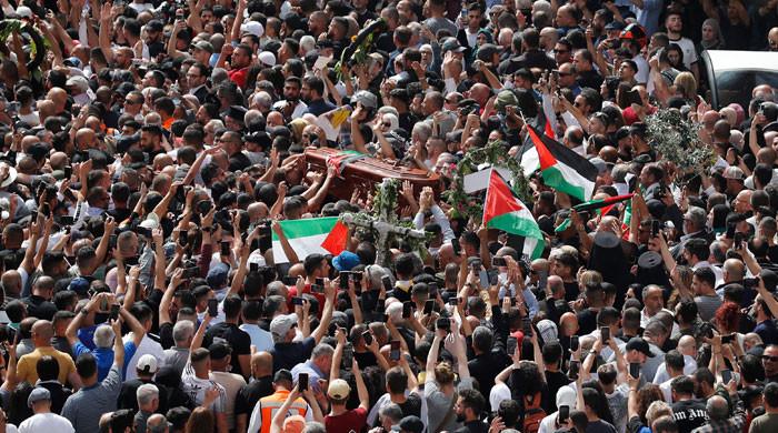 Thousands mourn at Jerusalem funeral for Al Jazeera journalist killed ...