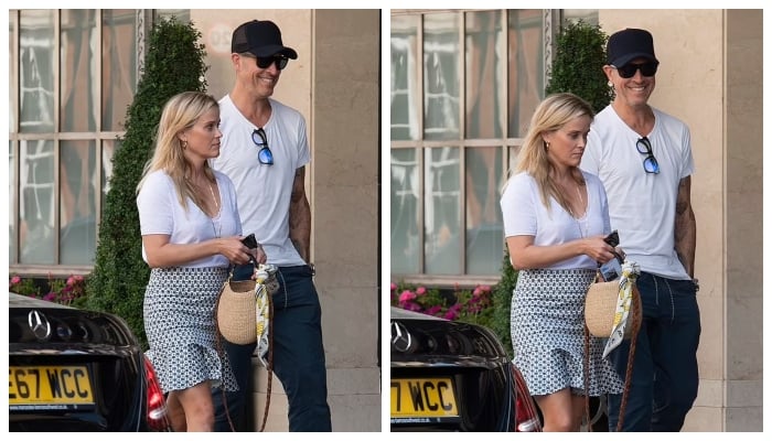 Reese Witherspoon serves a killer look in green miniskirt and white top