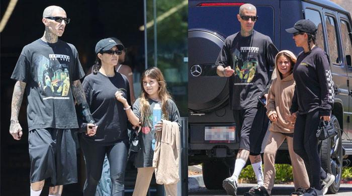 Kourtney Kardashian spotted holding hands with Travis Barker