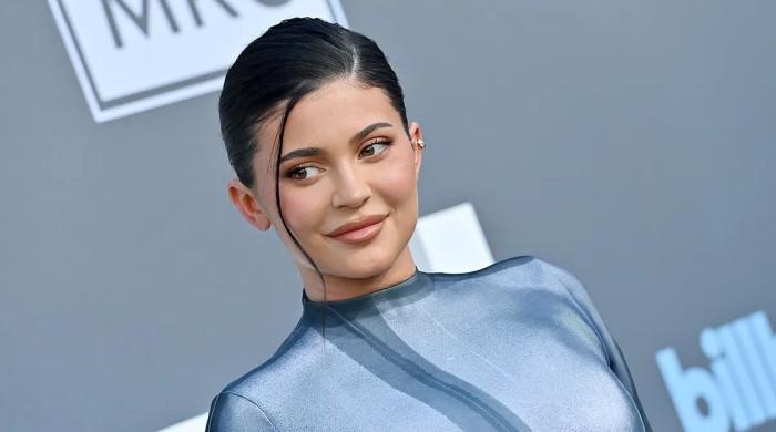 Kylie Jenner is facing backlash for photos in an Italy lab