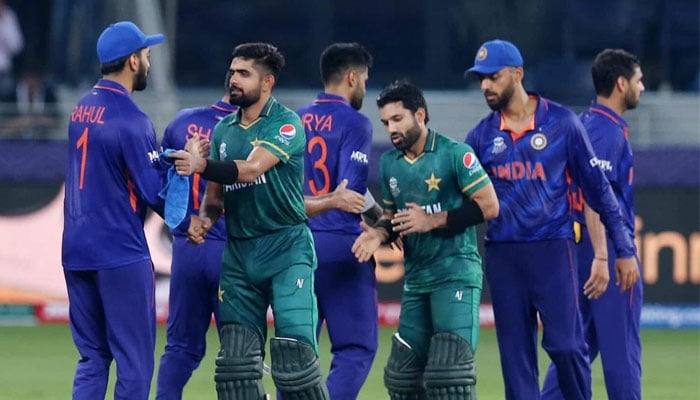 Pakistan and India players greet each other following Pak vs India match in t20 World Cup 2021. — Reuters