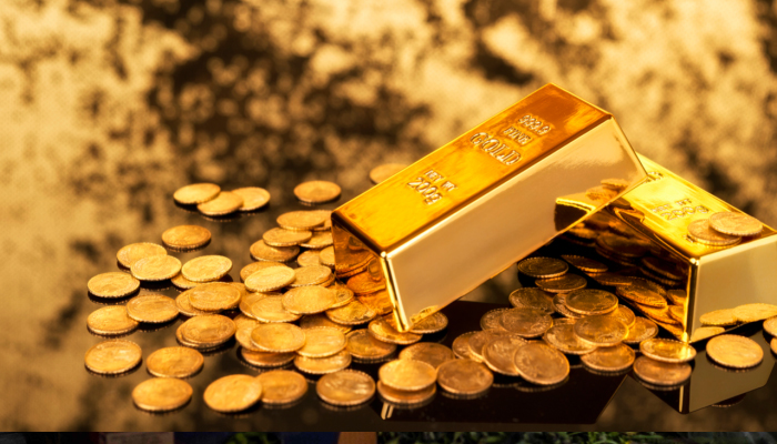 A representational image of gold bars and gold coins. — Reuters/File