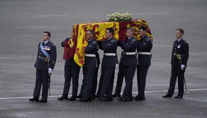 Queen Elizabeth coffin arrives in London amid tears and tributes