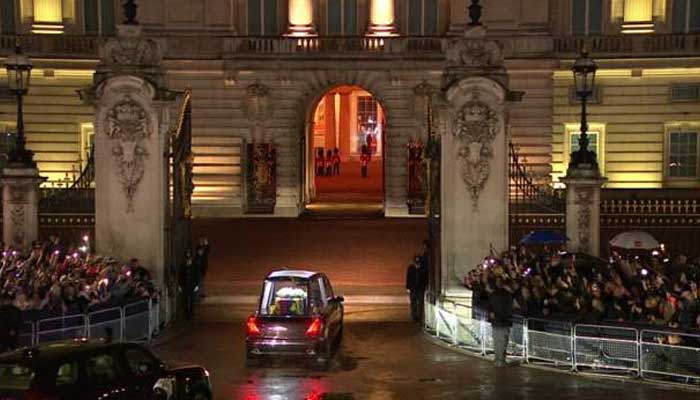 Meghan Markle, Prince Harry join royal family as Queens coffin arrives at Buckingham Palace