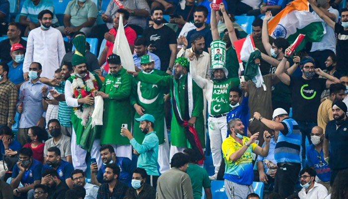 Cricket fans enjoying Pakistan vs India match during ICC T20I World Cup. — AFP