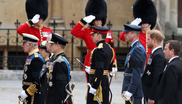 King Charles III (L) and members of the Royal family follow a gun carriage carrying the coffin of Queen Elizabeth II during her funeral service in Westminster Abbey- AFP