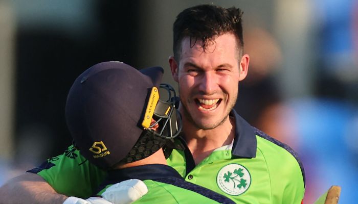 Ireland´s Curtis Campher and George Dockrell celebrate their victory during the ICC menâ€™s Twenty20 World Cup 2022 cricket match between Ireland and Scotland at Bellerive Oval in Hobart on October 19, 2022.— AFP