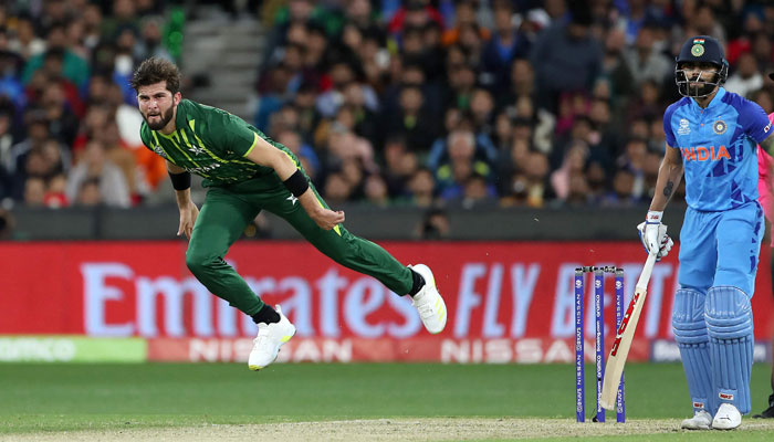 Shaheen Shah Afridi bowls past Virat Kohli during the ICC mens Twenty20 World Cup 2022 match between India and Pakistan at Melbourne Cricket Ground (MCG) on October 23, 2022. — AFP