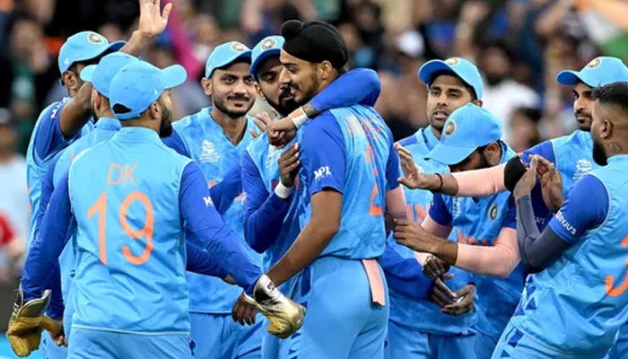 Indias Virat Kohli (C) greets Arshdeep Singh for his wicket of Pakistans Babar Azam during the ICC mens Twenty20 World Cup 2022. — AFP