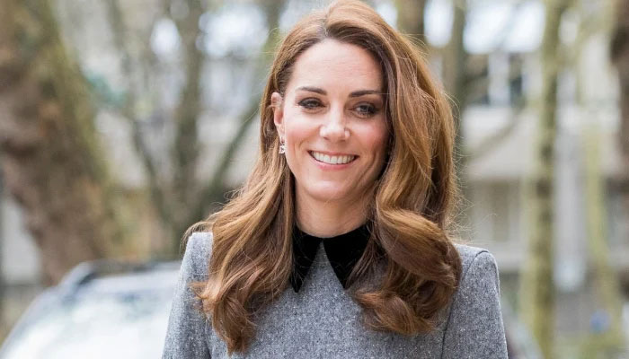 Kate Middleton reacts as she takes new patronage