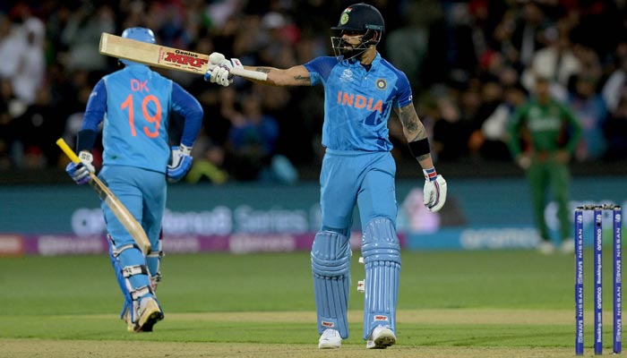 India´s Virat Kohli celebrates reaching his half century (50 runs) during the ICC men´s Twenty20 World Cup 2022 cricket match between India and Bangladesh at Adelaide Oval on November 2, 2022. — AFP