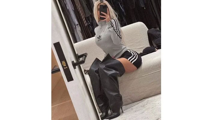 Kim Kardashian shows off her dramatic boots in latest mirror selfie