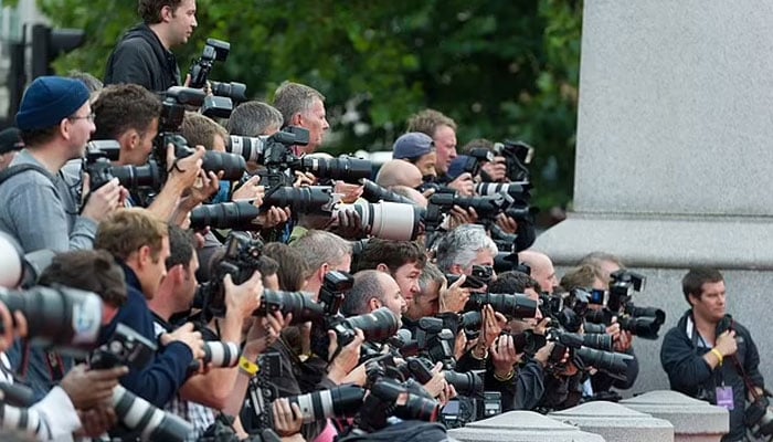 Photograph used in Harry and Meghan purportedly showing paparazzi hounding the Duke and Duchess of Sussex to get their best shot