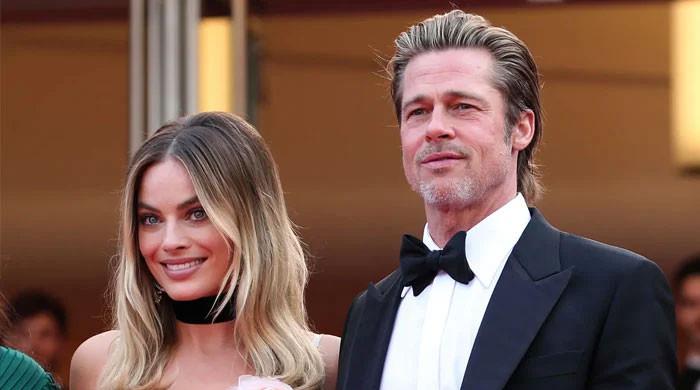 Brad Pitt Gushes Over ‘Babylon’ Co-star Margot Robbie: ‘She’s On Fire’