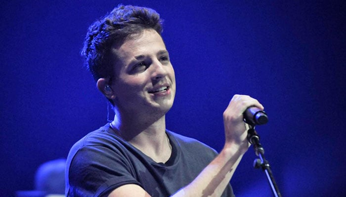 Watch Charlie Puth create a Christmas jingle out of an apple