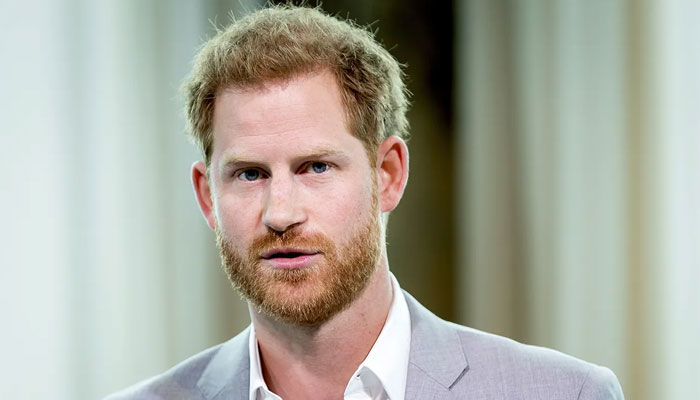 Prince Harry drinks during interview with Stephen Colbert