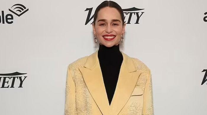 Emilia Clarke cuts a dazzling figure in a cream coloured co-ord at the ...