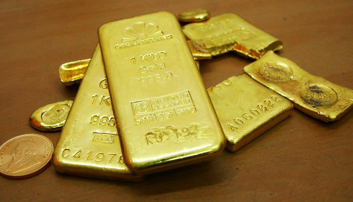 Gold bars are displayed at a gold jewellery shop in the northern Indian city of Chandigarh on November 4, 2009. — Reuters