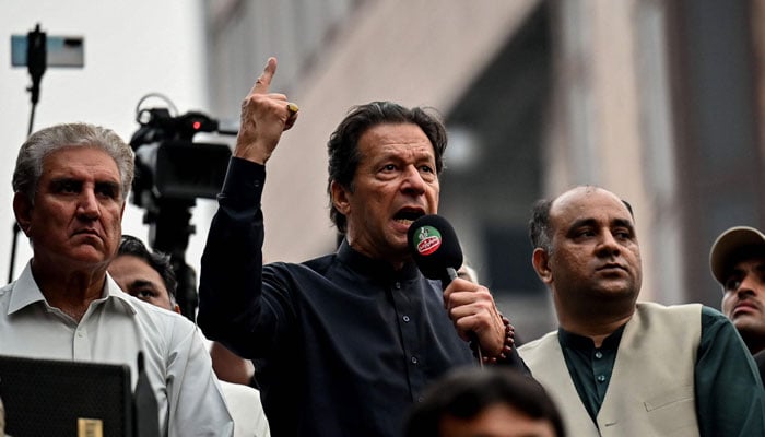 PTI Chairman Imran Khan addressing a rally in this undated photo. — AFP/File