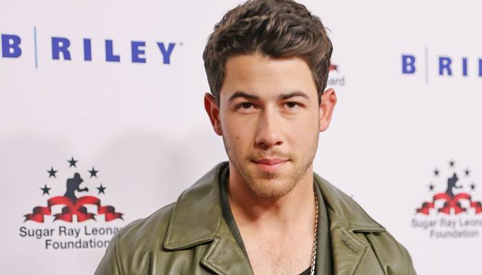 Nick Jonas spends time with Raising Cane’s founder at the Super Bowl: Photos