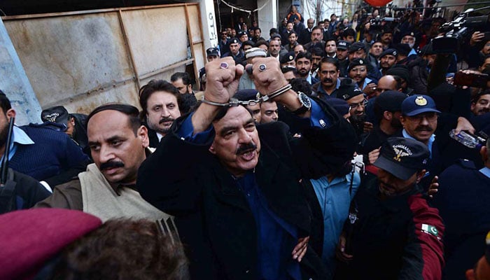 Former interior minister Sheikh Rashid Ahmed leaving the court. — APP/File