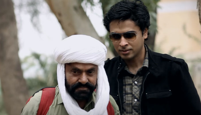 A screengrab from a video song Beya Beya showing Balochi folk singer Wasu Khan (left) and famous Shehzad Roy. — YouTube/@HazaarDastaanFilms