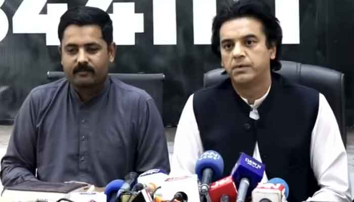 Pakistan Tehreek-e-Insaf (PTI) leader Usman Dar speaking during a press conference with Javed Ali in Lahore on February 26, 2023. — Twitter screengrab/PTI