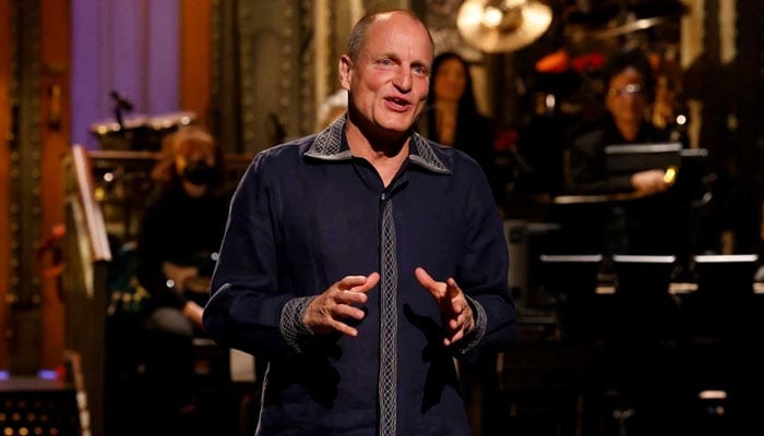 Woody Harrelson makes COVID vaccine conspiracy jokes on SNL, sparks debate