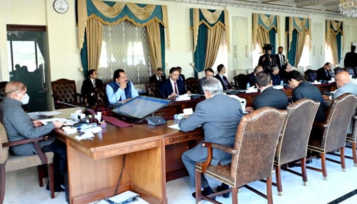 Prime Minister Shehbaz Sharif chairs a meeting on the availability and price control of essential items during the holy month of Ramadan in Islamabad, on February 27, 2023. — PID