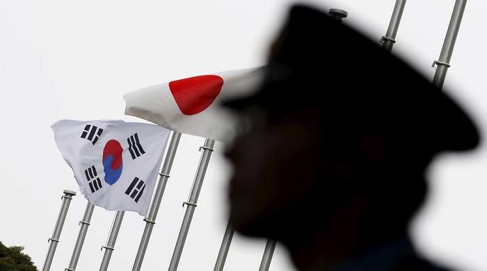 China, North Korea Loom Large As South Korea, Japan Try To Make Amends